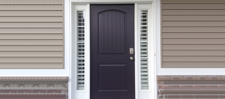 Sidelight Shutters On Black Door In Boston, MA